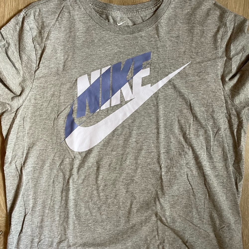 Grey The Nike Tee with periwinkle swoosh